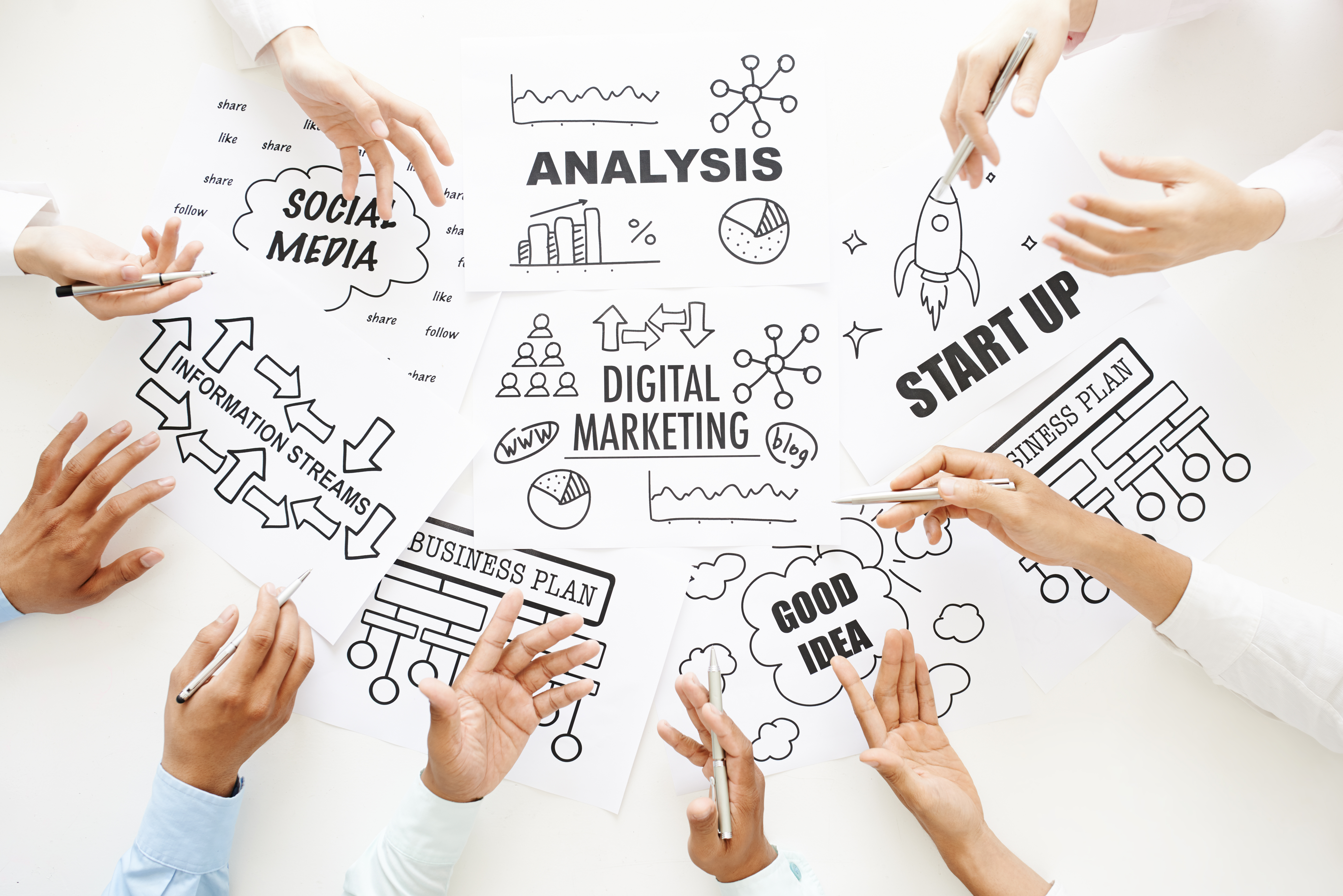 Team brainstorming and analyzing business strategy options